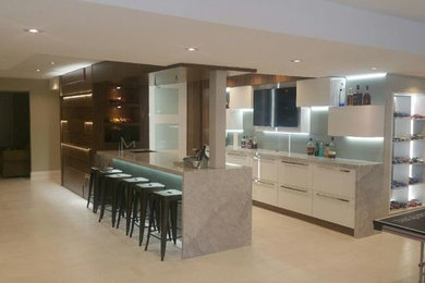 Large minimalist basement photo in Toronto