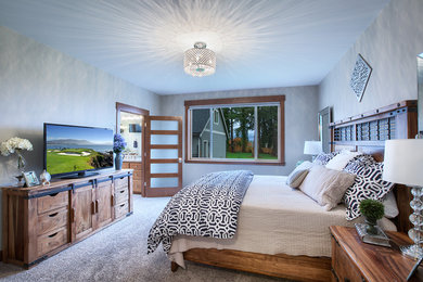 Example of a mid-sized arts and crafts master carpeted bedroom design in Seattle with beige walls