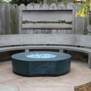 Concrete fire pit lounge area