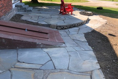 Patio - mid-sized cottage patio idea in Burlington