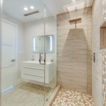 Walk-In Shower with Pebble Mosaic Niche and Bench