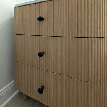Panoramic Penthouse: Slatted-Wood Vanity with Matte-Black Knobs