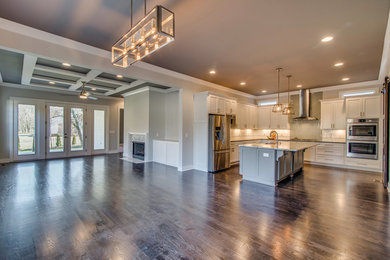 Inspiration for a transitional dark wood floor kitchen/dining room combo remodel in Nashville with gray walls