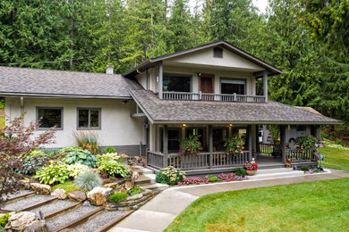 Example of a large mountain style home design design in Vancouver