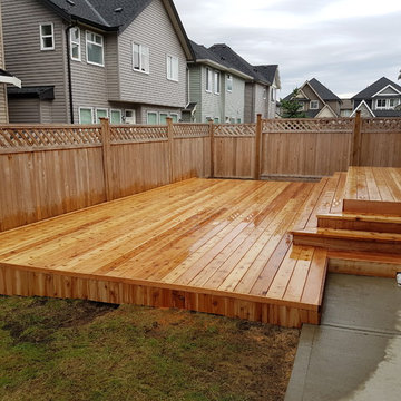cedar deck with wrap around stairs