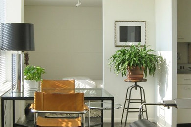 Inspiration for a small 1950s dining room remodel in Chicago with white walls