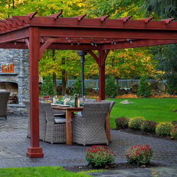 Make a Statement with a Versatile Outdoor Kitchen and Double Fire Feature