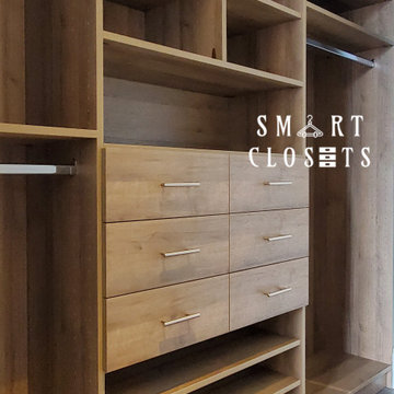 Master Walk In and Wall Unit Closet in Esterel Finish Designed by Smart Closets