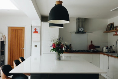 This is an example of a medium sized scandinavian kitchen in West Midlands.