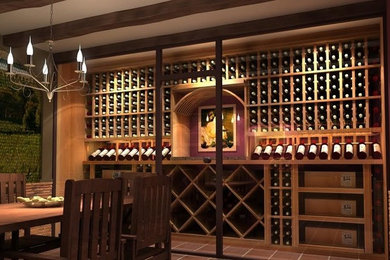 Mid-sized transitional porcelain tile wine cellar photo in Madrid