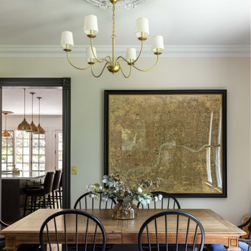 Dining room with brass chandelier and period detailingbrass chandelier,dining ro