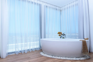 Imagen de cuarto de baño actual con bañera exenta