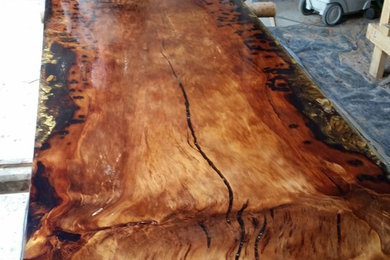 Kauri slab table top with clear resin.
