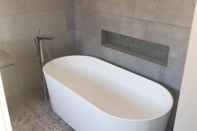 This is an example of a contemporary bathroom in West Midlands.