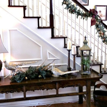 Traditional Christmas Garland and Decor in Staircase and Entry