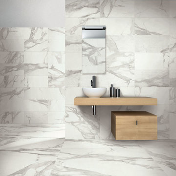 Modern bathroom with light wood vanity and carrara marble look porcelain tile