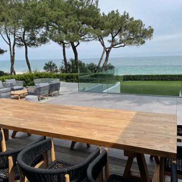 Millboard decking in Smoked Oak extending interior flooring outdoors.