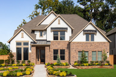 Example of a transitional exterior home design in Houston