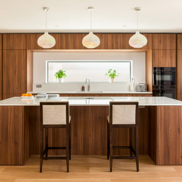 Walnut Handleless Kitchen with a Sleek & Seamless Design