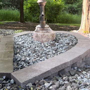 Custom Retaining Wall, Fountain Feature & Patio Integration in Wooded Backyard –