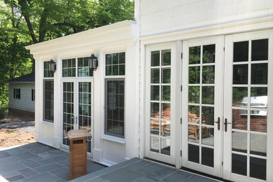 Sunroom - large traditional sunroom idea in New York