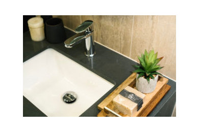 Photo of a small contemporary powder room in Toronto.