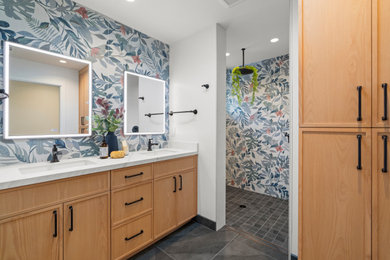 Bathroom - mid-sized transitional master multicolored tile and porcelain tile cement tile floor, gray floor and double-sink bathroom idea in San Francisco with shaker cabinets, light wood cabinets, a bidet, multicolored walls, a drop-in sink, quartz countertops, white countertops, a niche and a built-in vanity