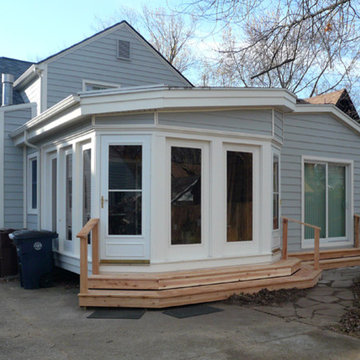 26 New Composite Widows, Green Composite Siding and New Gutters Too!