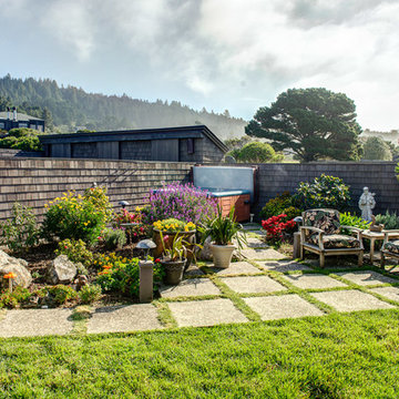This beautiful garden with hot tub provides a welcoming and private entrance.