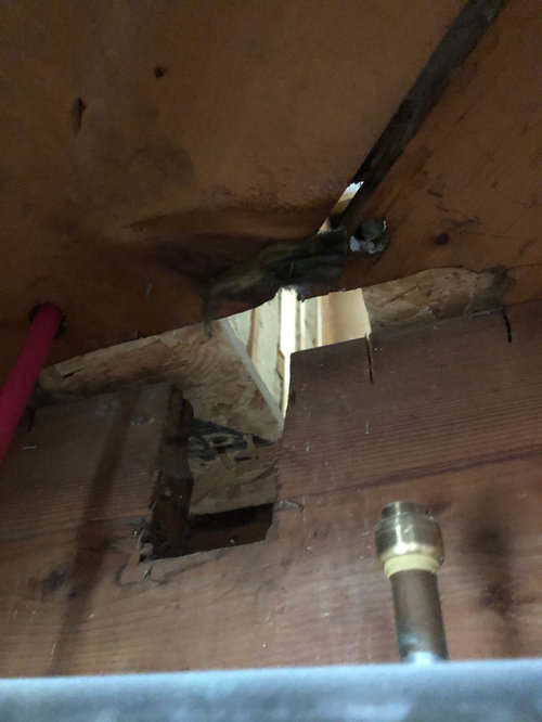 what to do if shower drain falls on joist