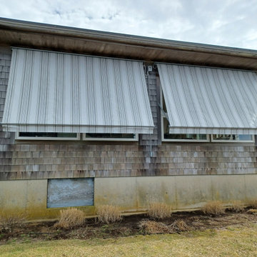 Retractable Window Awnings for a home on Cape Cod