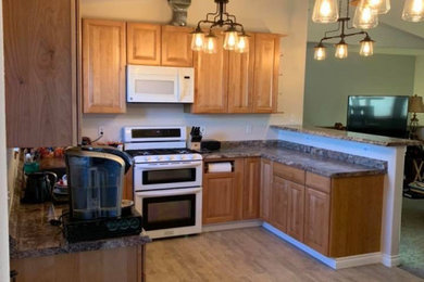 Arts and crafts kitchen photo in Other