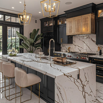 Bold Elegance – Black & Gold Kitchen with Striking Veined Surfaces