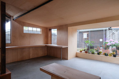 Inspiration for a mid-sized contemporary built-in desk concrete floor and gray floor home studio remodel in San Francisco