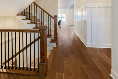 Example of a country staircase design in Other