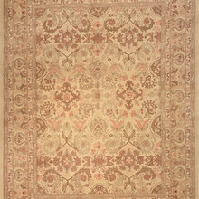 Hand-woven rug with an ivory-colored,accented shades of brown, olive
