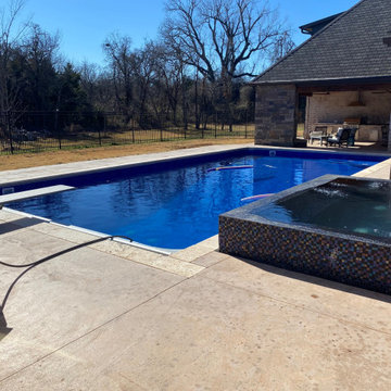 Polymer vinyl liner pool w/concrete spillover spa & automatic pool cover