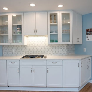 cabinet refacing--white shaker, quartz countertop, hexagon splash