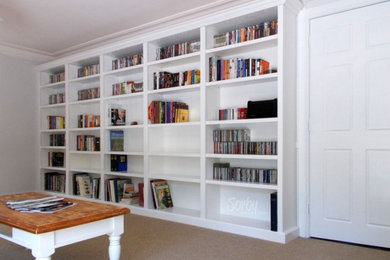 Inspiration for a mid-sized country family room in Sydney with a library.