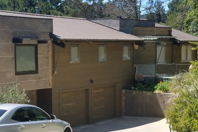 Example of an exterior home design in Other