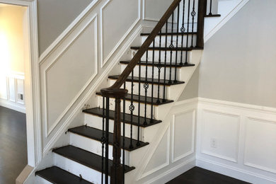 Example of a large classic wooden l-shaped mixed material railing staircase design in Tampa with wooden risers