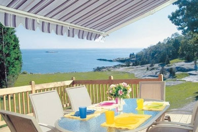 Deck - mid-sized transitional backyard deck idea in Philadelphia with an awning