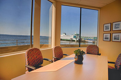 Example of a mid-sized trendy home office design in Seattle