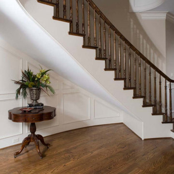 Curved Staircase with a Hard Maple Stair Handrail and Custom Made Balusters