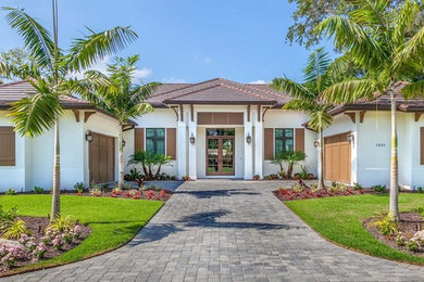 Inspiration for a tropical home design remodel in Tampa