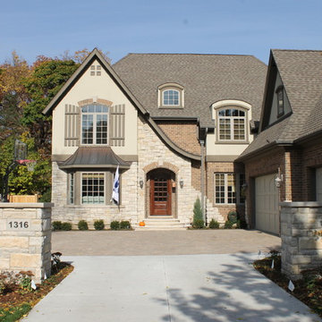 New Entry Courtyard flanked by Stone Piers