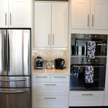 Grimslov (IKEA) white and grey kitchens