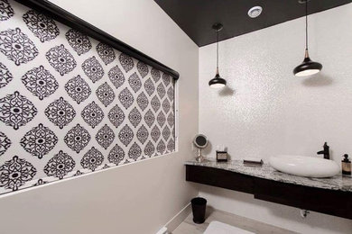 Bathroom - mid-sized transitional porcelain tile and beige floor bathroom idea in Other with beige walls, a vessel sink and granite countertops