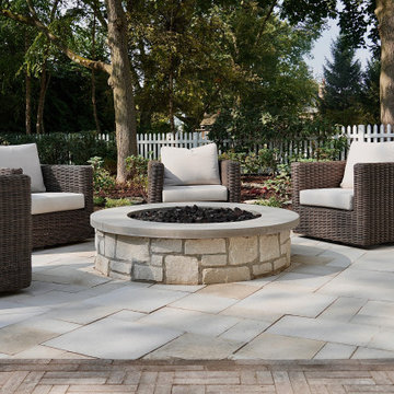 Stone Fire Pit with Woven Lounge Seating