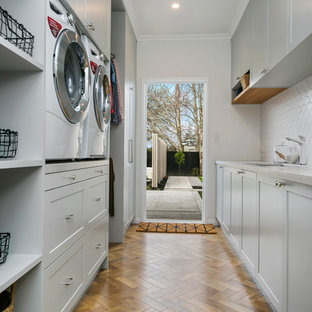 75 Beautiful Laminate Floor Laundry Room With Marble Countertops